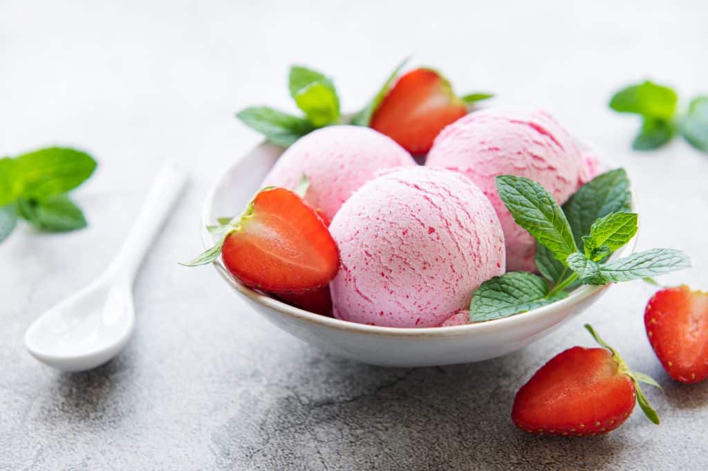 Homemade strawberry ice cream with fresh strawberries