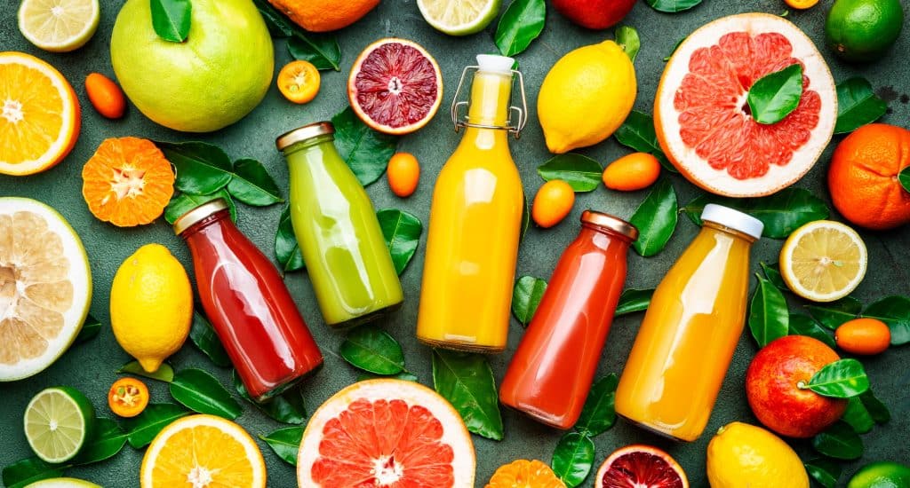 Summer drinks. Citrus fruit juices, fresh and smoothies, food background, top view